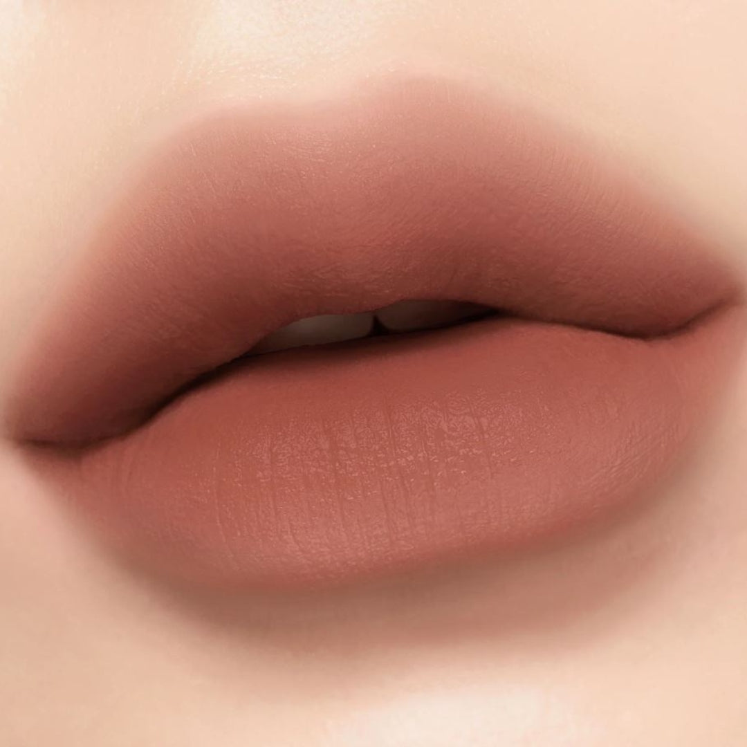 Peripera Ink Velvet 23 Nutty Nude shade on the lips